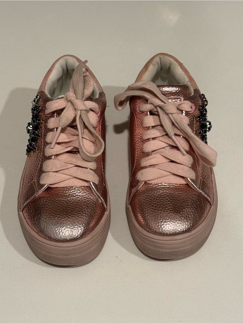 Kurt Geiger Rose Gold Metallic Lace-Up Sneakers with Pink Laces and Jewel Detail